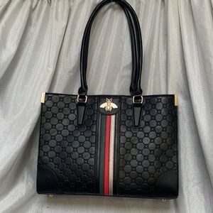 Elegant Black Tote with Red and Green Stripes